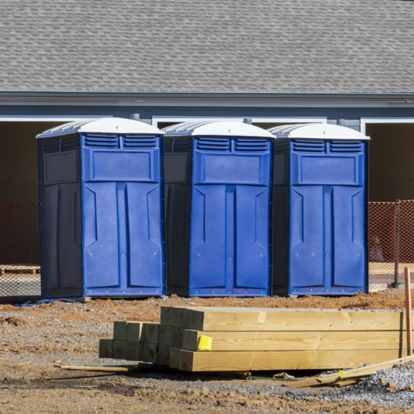 what is the cost difference between standard and deluxe porta potty rentals in Aurora